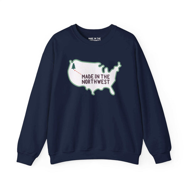 Evergreen is Where It's At Sweatshirt Show your love for the Pacific Northwest with our exclusive "Evergreen is Where it's At" sweatshirt. This design features the woodgrain United States with a tree marking the PNW location, highlighted by an arrow and t