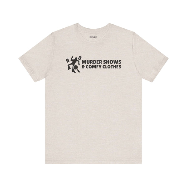Murder Shows & Comfy Clothes T Shirt featuring a minimalist dark graphic and bold text.