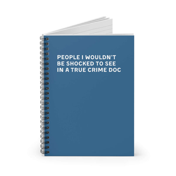 Blue spiral notebook titled 'People I Wouldn't Be Shocked to See in a True Crime Doc' for jotting down names.