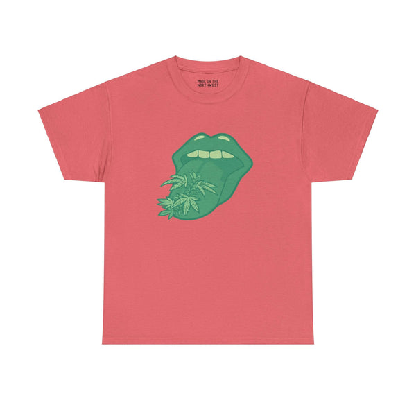 Pink athletic tee featuring a bold green tongue with marijuana leaves design on the front.