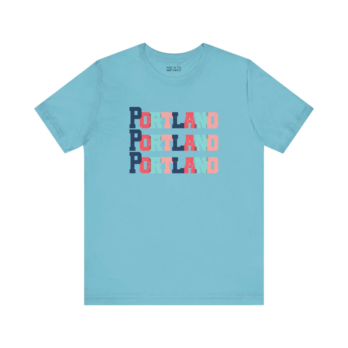 Bold and Bright Portland Trio Soft Tee in blue with colorful block-letter design celebrating Rose City style.