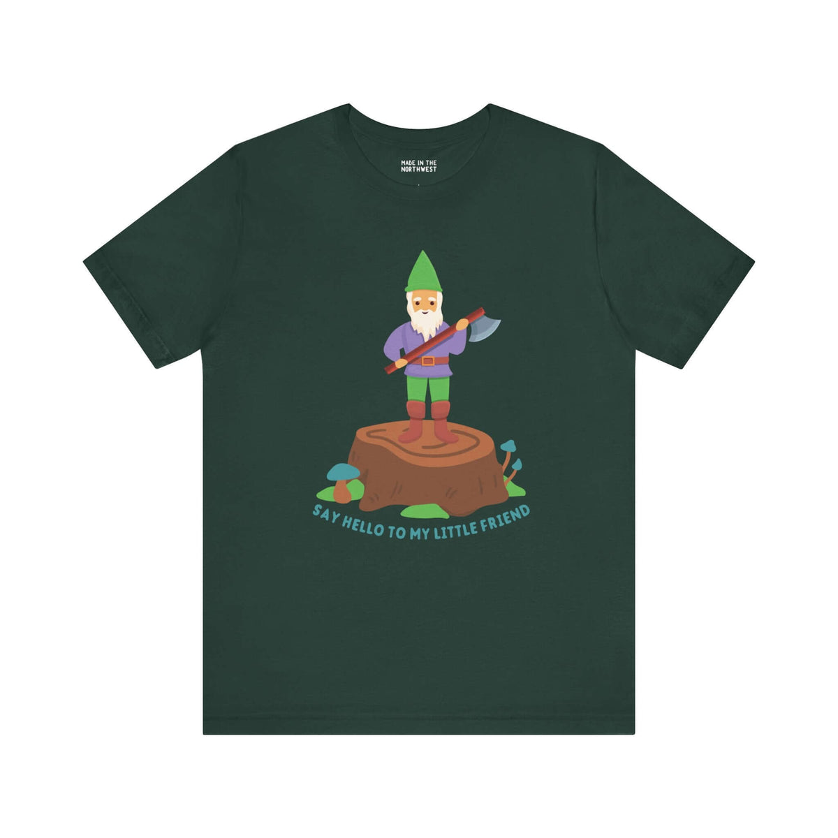 Green tee featuring a gnome on a stump with an axe, alongside the text 'Say hello to my little friend'. Perfect blend of humor and style.