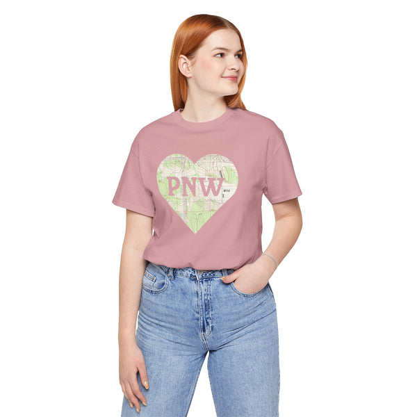 Woman wearing PNW Explorer's Heart Premium Soft Tee with a topo map heart design.