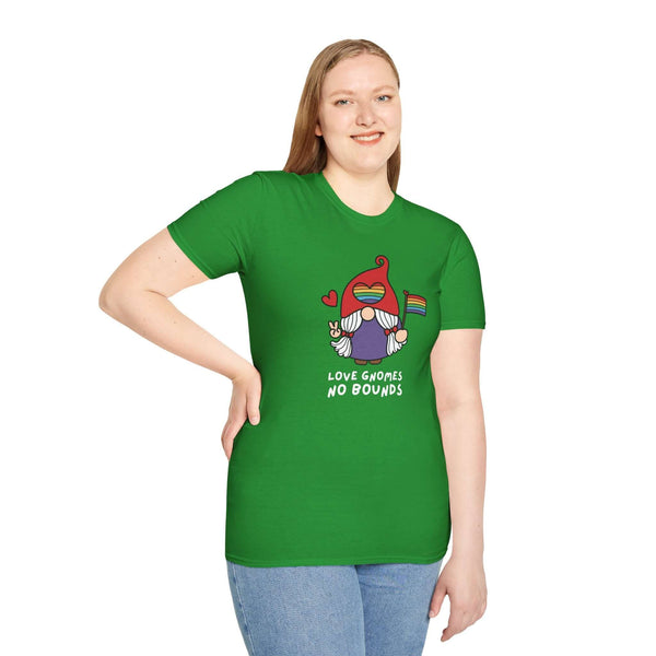 Model wearing a green Love Gnomes No Bounds T-shirt with a gnome holding a rainbow flag, promoting love and inclusivity.
