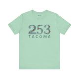 Floral 253 Tacoma soft tee in green, showcasing Pacific Northwest pride with stylish area code design.