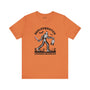 Skelesquatch Halloween premium soft tee featuring a skeleton Sasquatch with knife and mask, perfect for spooky fun.