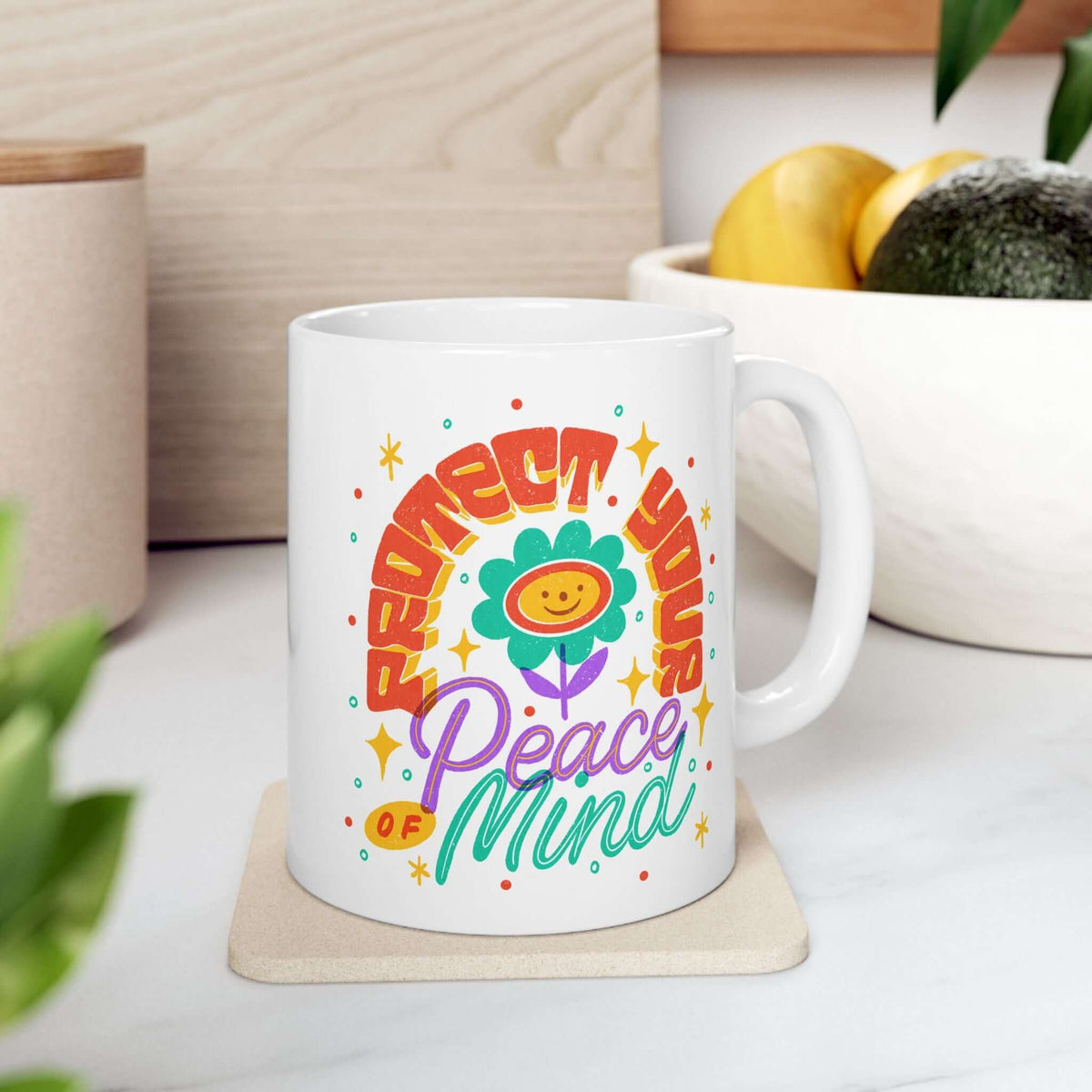 Protect Your Peace of Mind Mug featuring colorful artwork on a glossy white ceramic surface.