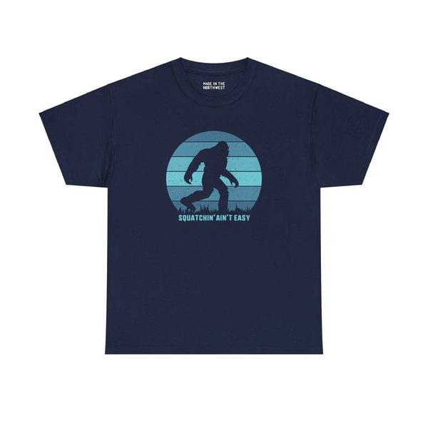 "Squatchin' Ain't Easy Athletic Tee with Bigfoot graphic, perfect for Sasquatch enthusiasts and Northwest legend fans"