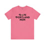 Pink tee with "Dope Portland Mom" text, featuring marijuana leaf design replacing the "O" in "Dope", celebrating Portland's vibrant spirit.