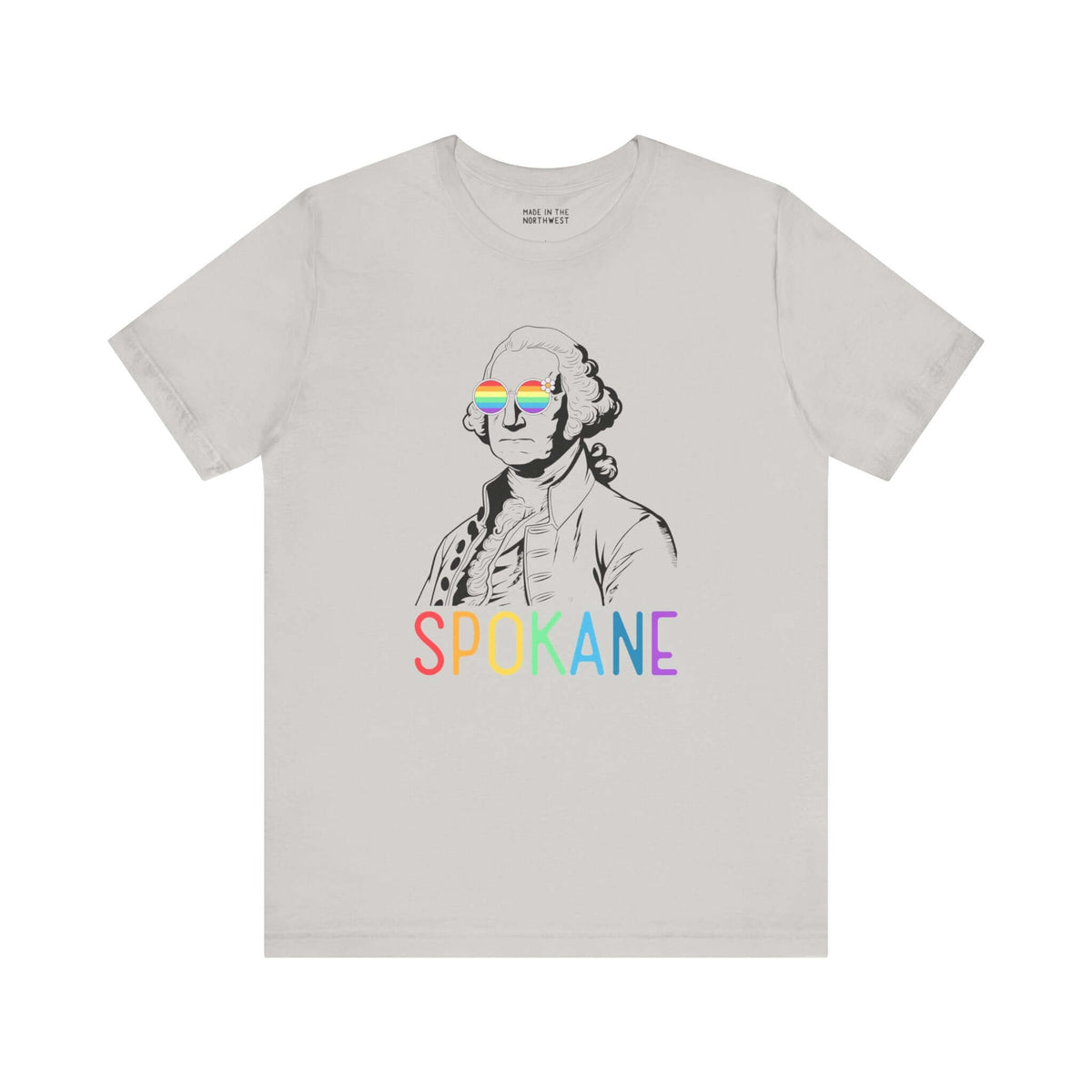 Spokane Pride tee with George Washington in rainbow glasses and vibrant "Spokane" lettering, celebrating inclusivity and local heritage.