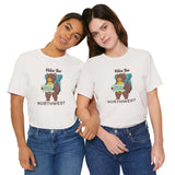 Two models wearing Hike the Northwest t shirt featuring a bear with a backpack and map, perfect for outdoor adventures.