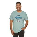 Man wearing a light blue 'Pimpin Not Pimpin' tee featuring Subaru GL 1600 graphic design.