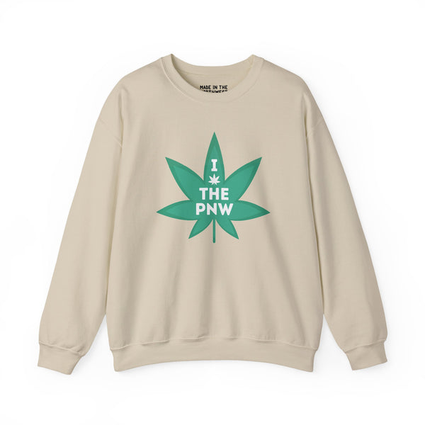 Cozy beige sweatshirt featuring a green marijuana leaf graphic and 'I THE PNW' text, celebrating Pacific Northwest love.