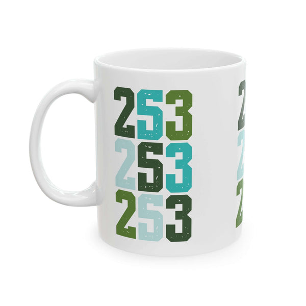 Two-Five-Three Pop Tacoma ceramic mug with vibrant stacked area code design in green and blue.