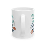 Wake Up and Smell the Coffee Mug with colorful lettering and a comfortable C-handle for enjoyable sipping.