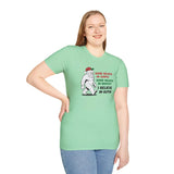 Believe in Santa and Bigfoot tee worn by a woman, featuring Bigfoot in a Santa hat with the text about holiday beliefs.