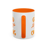 Good Things Are Coming Mug with a white exterior and orange interior, featuring playful lettering.