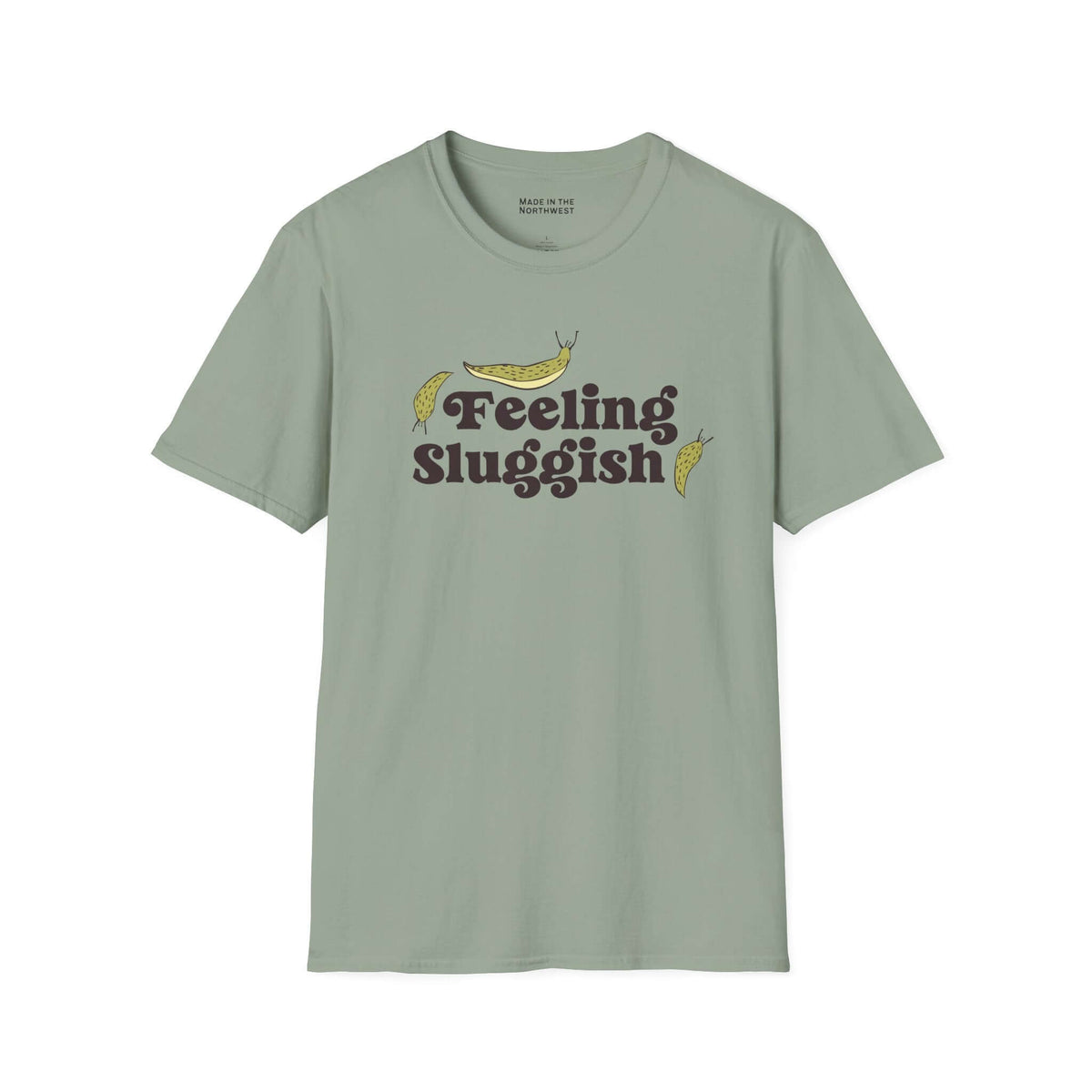 Feeling Sluggish T Shirt featuring playful slug graphics and a humorous text design on a soft green fabric.