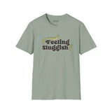 Feeling Sluggish T Shirt featuring playful slug graphics and a humorous text design on a soft green fabric.