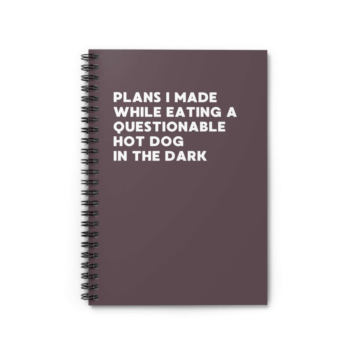 Spiral notebook titled 'Plans I Made While Eating a Questionable Hot Dog in the Dark' with a dark cover.