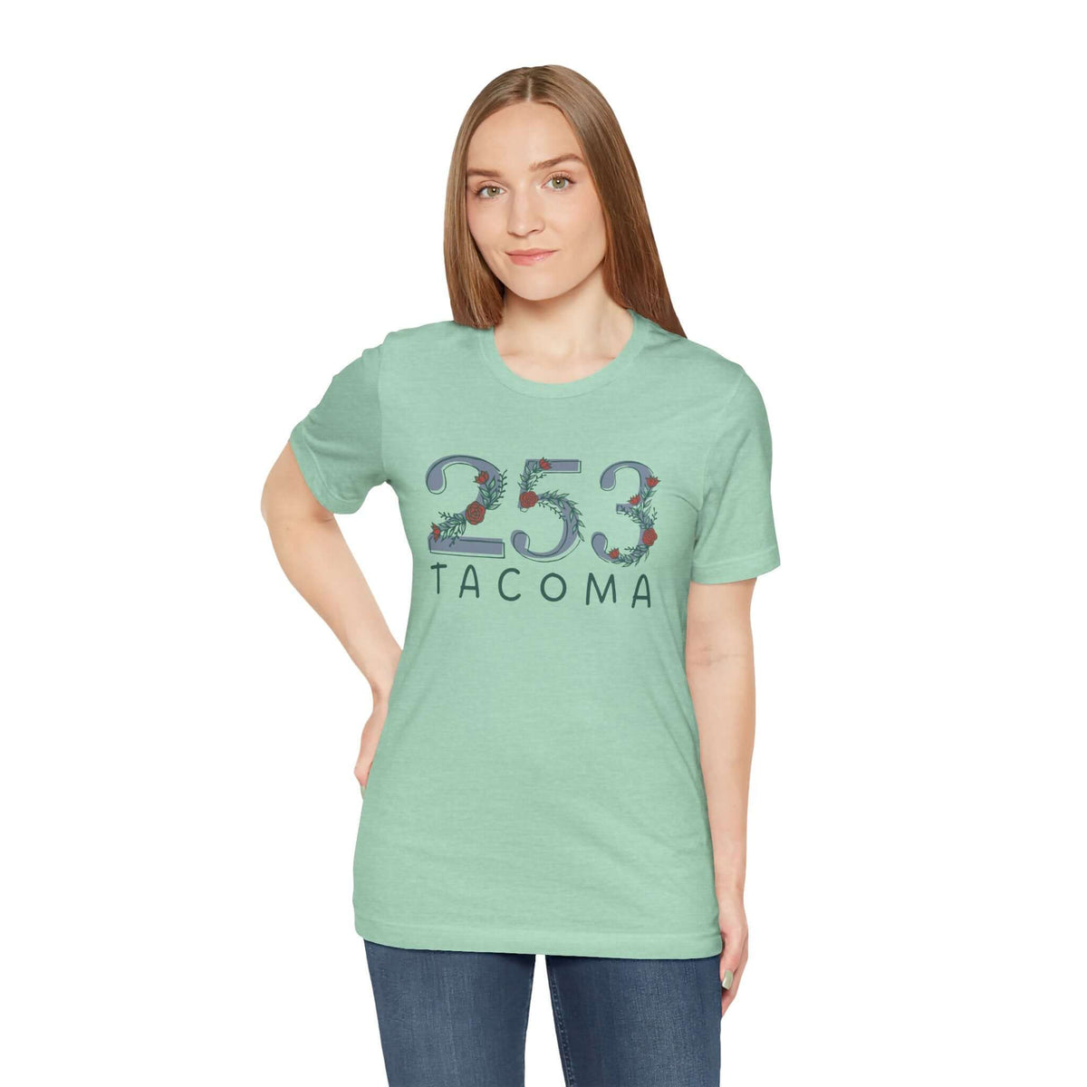 Woman wearing a mint green 253 Floral Area Code tee representing Tacoma, ideal for Pacific Northwest pride and style.