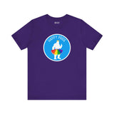 Purple tee featuring a Bigfoot silhouette in a rainbow tutu with text 'Happy Pride', celebrating Pride spirit.