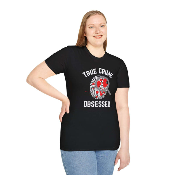 True Crime Obsessed T Shirt featuring a magnifying glass and fingerprint design worn by a model.