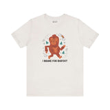 I Brake for Bigfoot Premium Soft Tee featuring whimsical Sasquatch graphic, perfect for fans of folklore.