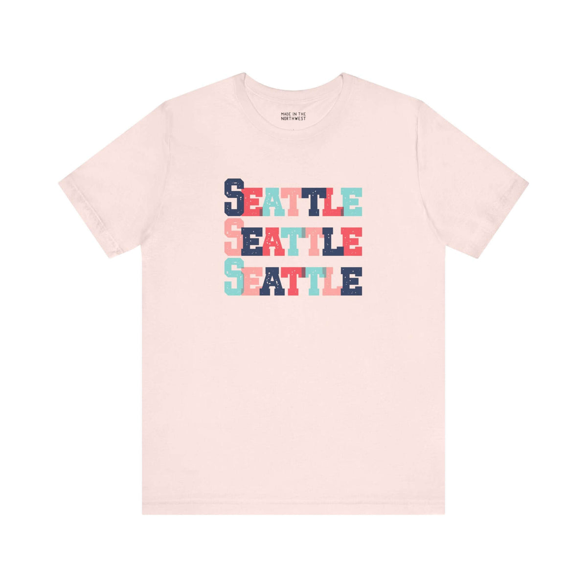 Bold and bright Seattle trio premium soft tee featuring colorful block lettering design.
