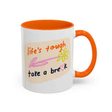 Life's Tough Take a Break Mug featuring cheerful hand-drawn lettering and vibrant orange accents.