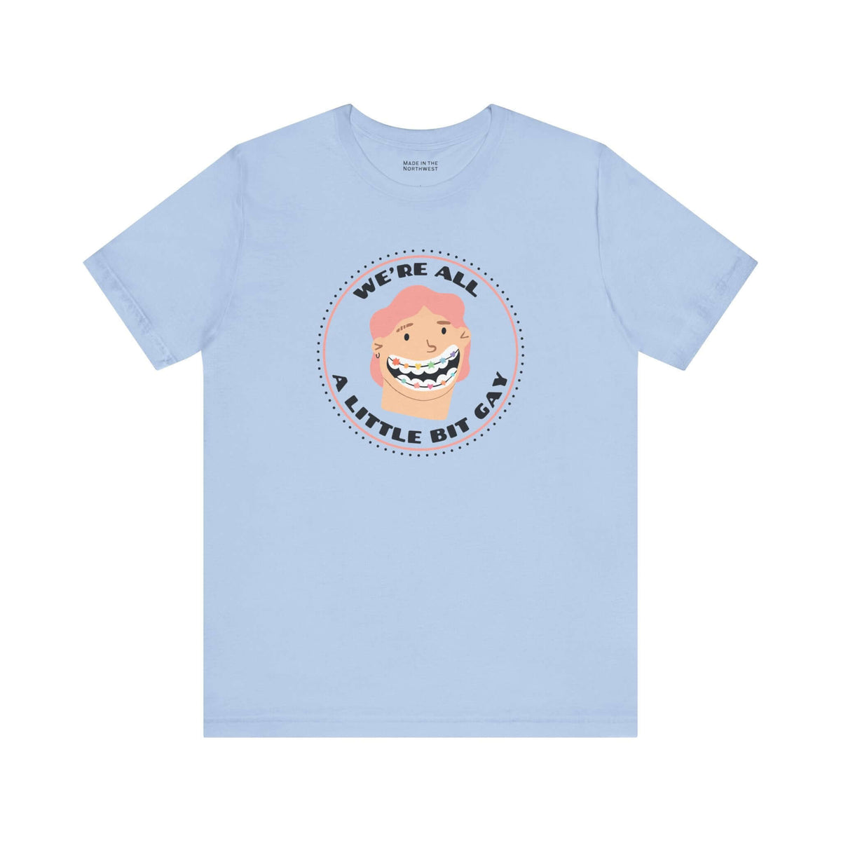 We’re All a Little Bit Gay Tee featuring a playful design on a light blue shirt.