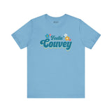 Feelin' Couvey retro soft tee in light blue featuring colorful 70s-inspired flowers and playful text design.