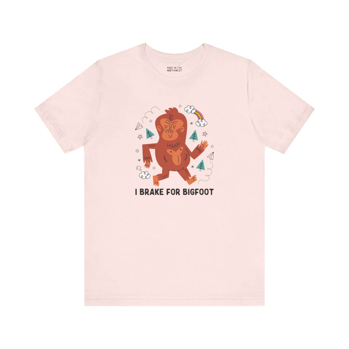 I Brake for Bigfoot Soft Tee Show your playful side and love for local folklore with our "I Brake for Bigfoot" Sasquatch Tee. This fun design features the phrase "I Brake for Bigfoot" alongside a whimsical graphic of a Sasquatch, perfect for those who enj