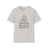 Keep Calm & Squatch On Bigfoot softstyle t-shirt featuring a Sasquatch graphic and forest design.