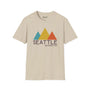 Modern Peaks Seattle Softstyle T-Shirt with minimalist mountain design in bold colors.