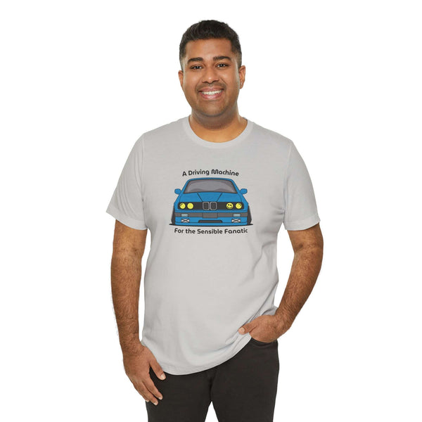 Man wearing A Driving Machine for the Sensible Fanatic premium soft tee featuring BMW E30 design.