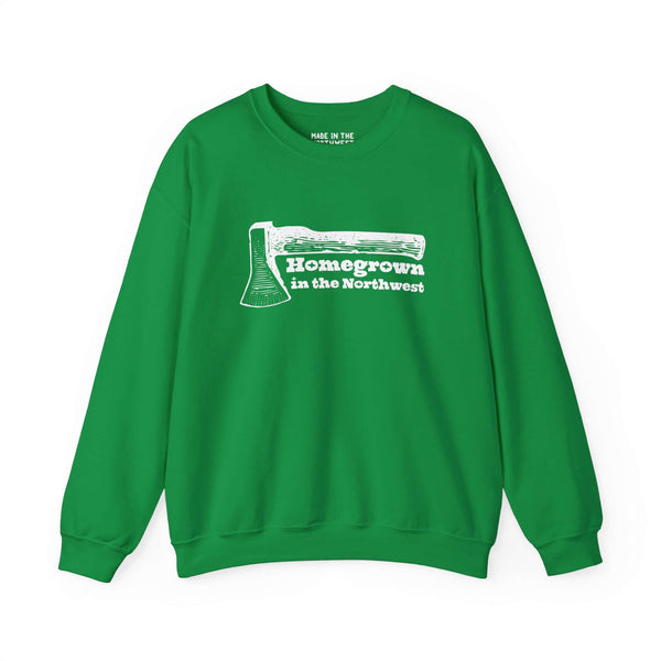 Green sweatshirt featuring "Homegrown in the Northwest" with rugged axe design, celebrating the Pacific Northwest spirit.