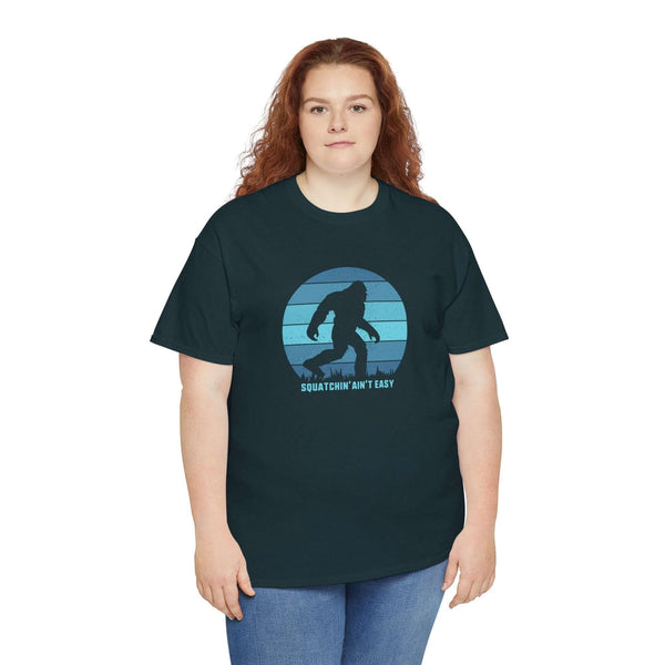 Model wearing Squatchin' Ain't Easy athletic tee with Bigfoot design, ideal for cryptid enthusiasts.