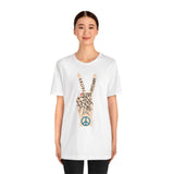 Model wearing Power in Peace Premium Soft Tee with peace sign and uplifting words promoting positivity and unity.