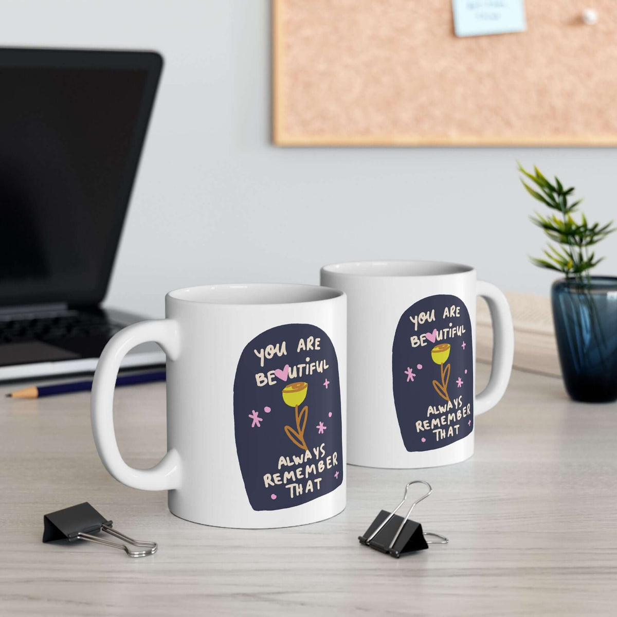 You Are Beautiful Always Remember That Mug displayed on a desk with stationery, highlighting its colorful design and ceramic finish.