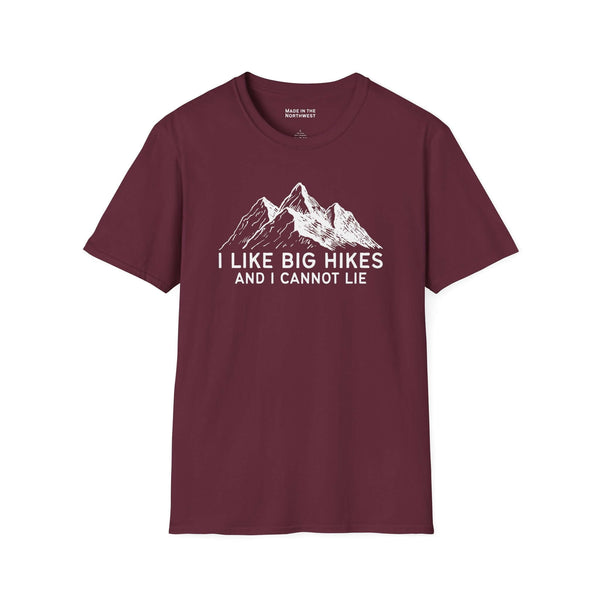 I Like Big Hikes and I Cannot Lie T Shirt displayed on a burgundy t-shirt with mountain graphic.