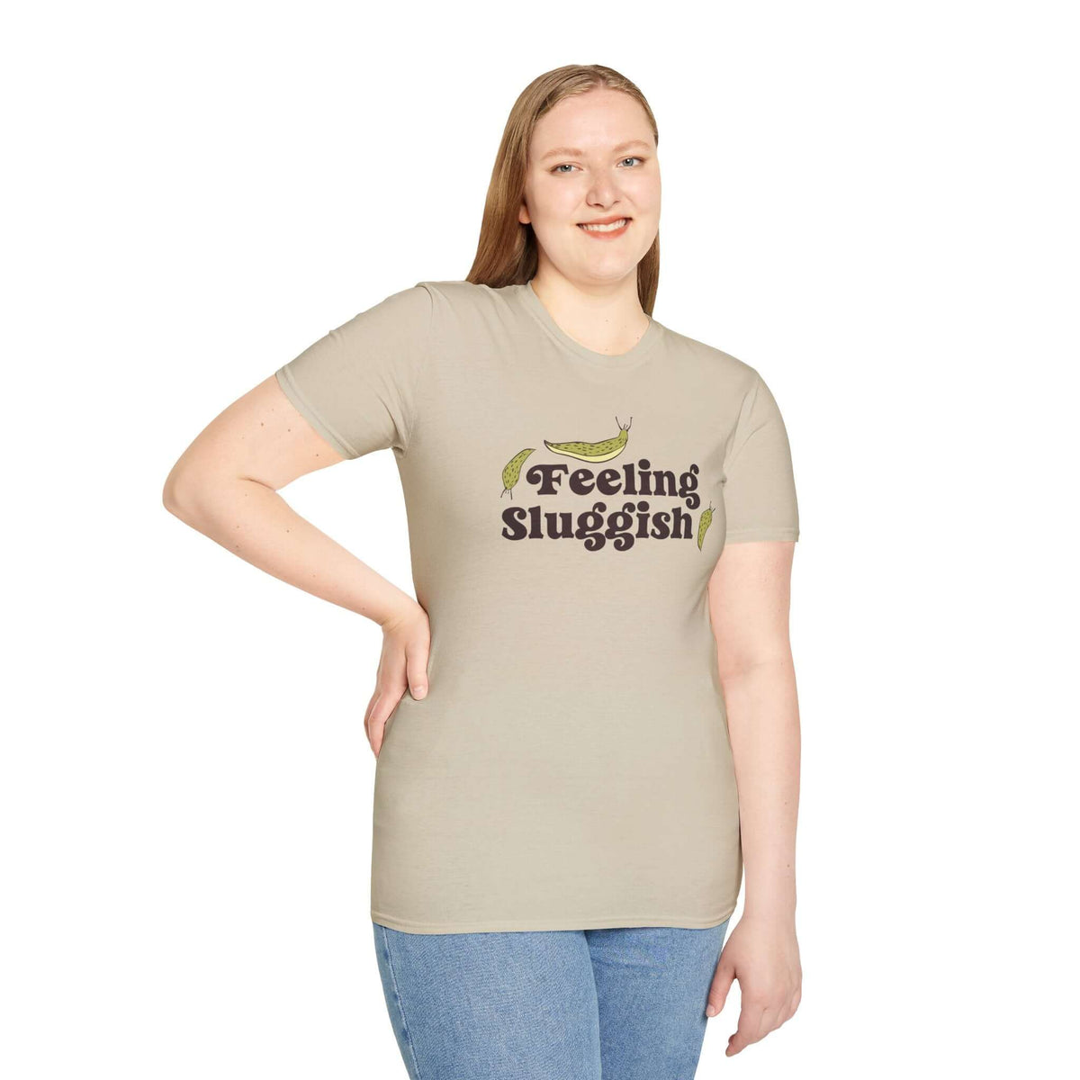 Woman wearing feeling sluggish t shirt with slugs and humorous text on a light background.