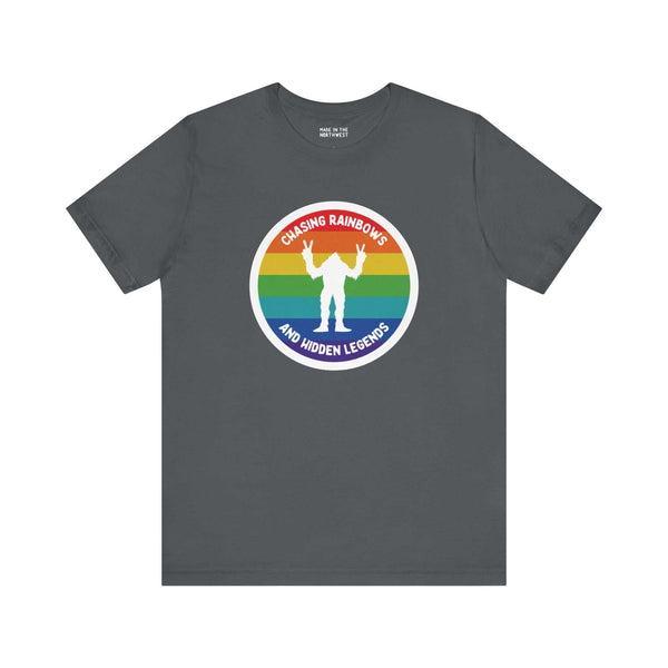 Chasing Rainbows Sasquatch Soft Tee Celebrate your roots with a splash of color and a touch of mystery in our "Hometown Pride" tee. Featuring a vibrant rainbow circle and a playful Sasquatch graphic, this shirt embodies the unique and spirited vibe of the