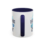 Everything Whale Be Okay Mug featuring playful whale illustration and blue interior.