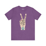 Power in Peace Premium Soft Tee featuring a hand peace sign with words of love, faith, and unity in purple.