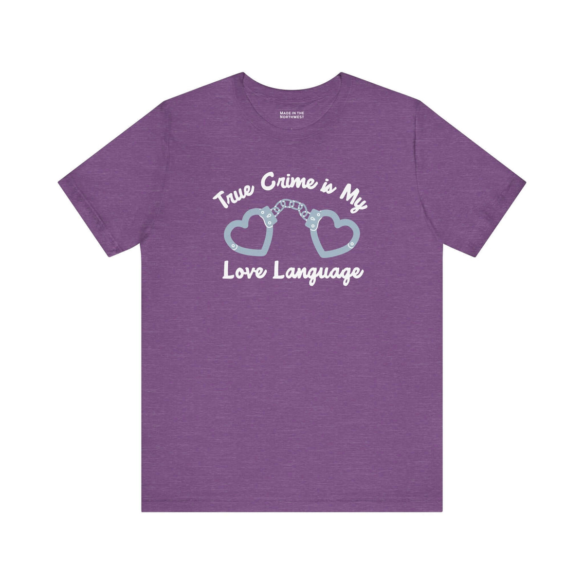 True crime is my love language t shirt featuring heart-shaped handcuffs design on a purple background.