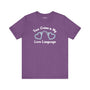 True crime is my love language t shirt featuring heart-shaped handcuffs design on a purple background.