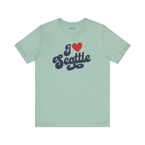 I love Seattle t shirt in light green with a cursive design showcasing love for Seattle.