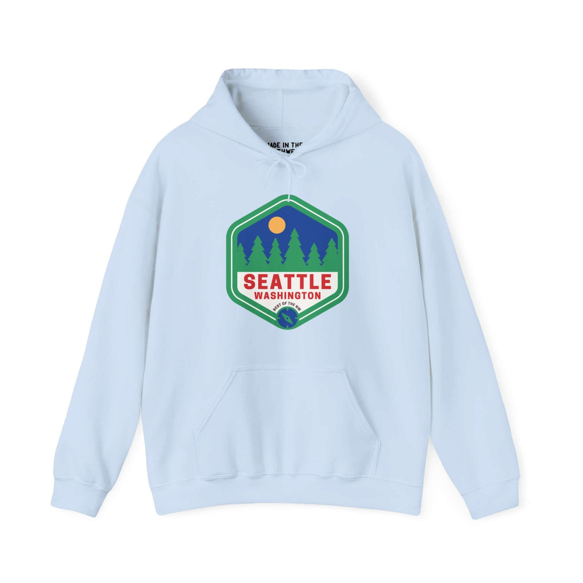 Retro Seattle hoodie with 90s badge and trees, showcasing Emerald City pride and Pacific Northwest nature.