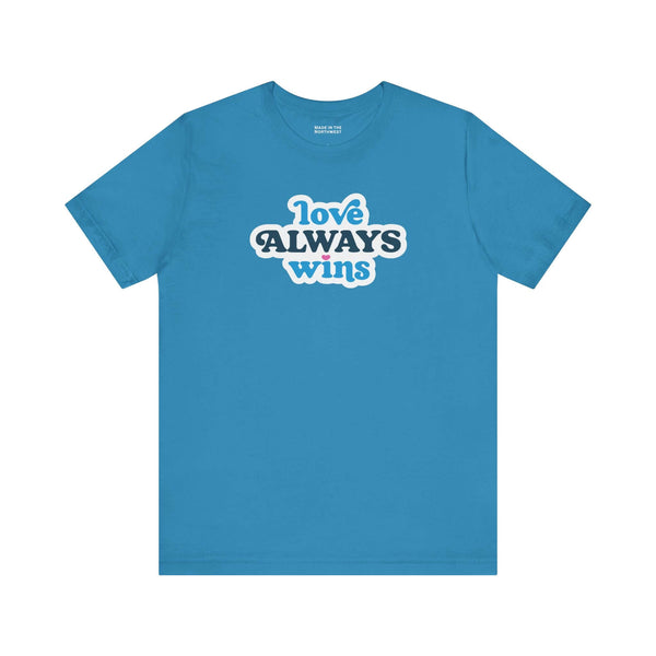 love always wins t shirt in blue featuring bold, colorful typography celebrating love.